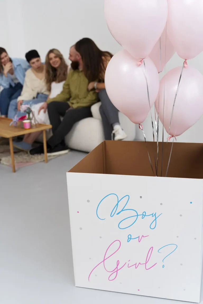 Excited friends and family gather around balloons revealing baby's gender - Dream IVF Cyprus, Celebrating New Beginnings with Joy and Anticipation